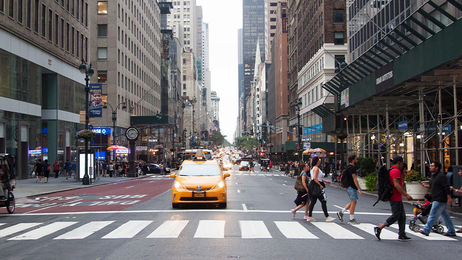 Pedestrians safely crossing at a crosswalk