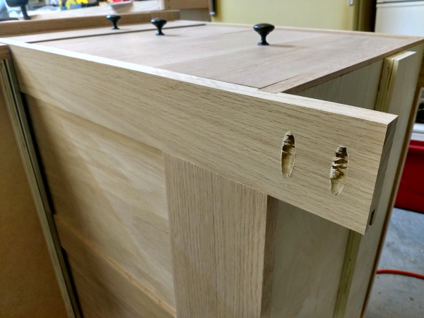 Furniture base with pocket holes made